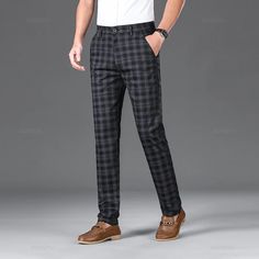 Introducing Oussyu High Quality Plaid Pants, the perfect choice for a stylish and sophisticated look!! These men's plaid pants offer a classic and timeless design, making them ideal for both formal and casual occasions. With their high-quality fabric and impeccable craftsmanship, these pants are built to last. Elevate your outfit with these versatile plaid pants that exude confidence and style. Shop now and make a fashion statement that will turn heads. Elegant Plaid Business Casual Pants, Elegant Plaid Pants For Business Casual, Classic Plaid Business Casual Pants, Classic Plaid Pants For Business Casual, Plaid Business Pants With Welt Pockets, Plaid Pants With Welt Pockets For Business, Elegant Plaid Pants For Business, Elegant Plaid Bottoms For Business, Plaid Tapered Leg Business Casual Pants