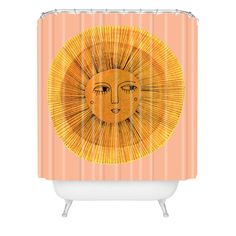 a shower curtain with an image of a sun face on it's front and side