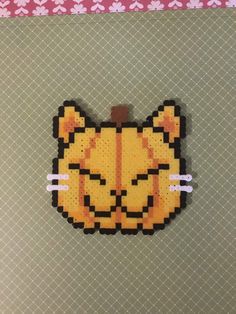 an image of a cat made out of perler beads