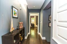 the hallway is clean and ready to be used as a home office or family room