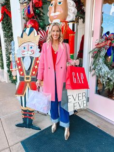 You will love this bold and fun pink and red outfit idea! I styled this pink and red top with wide cuff jeans, gold boots, and a pink coat. Wide Cuff Jeans, Cuff Jeans, Gold Boots, Pink Coat, Wide Cuff, Red Outfit