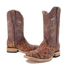 These handmade men's boots featuring handtooled leather and a square toe offer a classic western style. The Bulldog Hand Tooled Boots- Brown Bitone are a stylish and durable addition to any wardrobe. The vamp, heel and pull straps are hand tooled. Authentic Cowhide Leather Cow Leather Shaft Stitched sole Western Moto Boots For Western-themed Events, Western Goodyear Welted Moto Boots For Rodeo, Western Goodyear Welted Boots With Square Toe, Western Boots With Goodyear Welt Construction And Square Toe, Western Boots With Goodyear Welt And Square Toe, Western Moto Boots With Square Toe And Leather Sole, Western Style Moto Boots With Square Toe, Western Work Boots With Square Toe For Ranch, Western Square Toe Work Boots For Western-themed Events