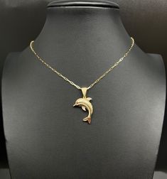 "Product Description: Immerse yourself in divine elegance with our 14k Real Gold Dolphin Pendants Necklace, with 14k Solid Gold 1.5mm Paperclips Chain Necklace , Dolphin Charm, 14k Solid Gold Dolphin Charm, a heavenly ensemble crafted to elevate your style. Item Features: Material: Expertly crafted from 14K Genuine Gold, ensuring a touch of luxury and authenticity. Chain Style: A mesmerizing blend of Dolphin Charm and a 1.5mm Paperclips Chain, offering a unique and stylish design. Stones: Embellished with Zirconia stones, adding a subtle sparkle to the Dolphin charm. Metal Stamp: Properly stamped with 14K for both the pendant and the chain, a mark of genuine gold. Available Lengths: Choose from various lengths - 16\", 18\", 20'', 22'', 24'' for a personalized fit. Weight: The Dolphin penda Angel Pendant Necklace, Real Gold Chains, Angel Pendant, Diamond Rings Design, 14k Gold Necklace, Gold Accessories, Real Gold, Paper Clip, Metal Stamping