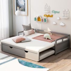 a child's room with a bed and toys on the floor