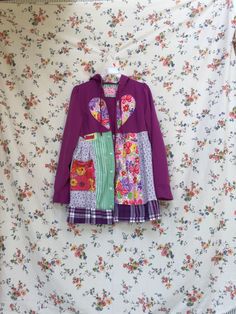 Casual Patchwork Button-up Outerwear, Oversized Multicolor Patchwork Outerwear, Retro Button-up Patchwork Outerwear, Patchwork Hoodie, Plaid Patchwork Button-up Outerwear, Bohemian Long-sleeved Floral Patchwork Outerwear, Tunic Sweater