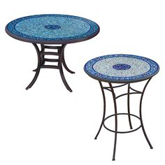 two tables with blue designs on them sitting next to each other in front of a white background