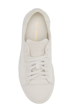 A smooth leather toe cap provides a subtle textural contrast to the luxe suede of this sophisticated and versatile monochrome sneaker. Lace-up style Leather upper and lining/rubber sole Made in Portugal Classic Cream Suede Sneakers, White Luxury Suede Sneakers, Luxury White Suede Sneakers, Classic White Suede Sneakers, Classic Cream Leather Sneakers, Suede Sneakers With White Sole And Embossed Logo, White Suede Sneakers With Rubber Heel Cap, Luxury White Sneakers With Rubber Heel Cap, Classic Cream Sneakers