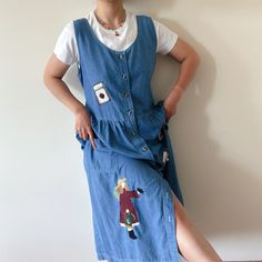 Vintage cute denim dress.  Excellent vintage condition Material: 100% cotton label size M. Model is 5'5'', 128 lbs, usually US size 5 Flat measurements: bust: 21'' (42'' around) waits: 22'' (44'' around) length: 48'' Follow us on Instagram (oldgemvintage) for more choices! Please ask me about international combined shipping.  Please check the flat measurements before purchase since all sales are FINAL. Except it is mistake on my part, in which case I will refund the purchase. I do my best to examine the garments but make mistakes sometimes, please let me know if that is the case. Thank you so much!  Please note that these are vintage clothing, and they may have slight signs of wear. I try my best to examine each piece and will write in note about holes, stains or other imperfections. But s Denim Overalls Dress, Embroidered Denim Dress, Vintage Denim Dress, Teacher Dresses, Dress Apron, Denim Pinafore, Patchwork Clothes, Cotton Labels, Jean Vintage