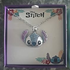 the stitch necklace is in its box