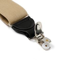 Look to tradition to create a modern, yet sophisticated style. Our Tan Clip Suspenders are designed to provide support without sacrificing comfort. The expert craftsmanship of our leather crosspatch suspenders do not restrict movement and will remain in place without slipping or having to adjust. Suspenders add a unique and versatile look that can be dressed up with a suit, or dressed down with jeans and a blazer. Classic Formal Adjustable Belts And Suspenders, Elegant Adjustable Belts And Suspenders For Work, Classic Adjustable Belts And Suspenders For Work, Adjustable Belts And Suspenders For Workwear, Elegant Business Belts And Suspenders With Adjustable Strap, Elegant Belts And Suspenders With Adjustable Straps For Business, Elegant Adjustable Straps Belts And Suspenders For Business, Classic Belts And Suspenders With Adjustable Strap For Everyday, Classic Belts And Suspenders With Adjustable Straps For Work