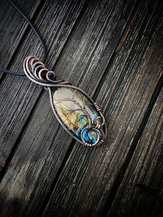 Handmade copper wire wrap Tree of Life pendant with a labradorite stone.  Comes with a 16-18 inch vegan leather chain as shown. Each piece is a unique, one of a kind work of art lovingly made with care and consideration of the person that will ultimately possess it.  Copper is said to be an enhancing metal, strengthening the metaphysical properties of the stone that it encompasses.   It is said to amplify optimism, activate chakras, and balance energy.  Copper is considered to be a healing metal Activate Chakras, Wire Wrap Tree, Balance Energy, Pendant Ideas, Wire Wrapping Stones, Les Chakras, The Tree Of Life