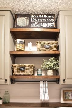 the shelves in this laundry room are organized with baskets and other items to keep things fresh