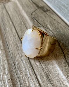 Gold dipped, adjustable, natural stone, open back. Iridescent. Modern Adjustable Oval Moonstone Ring, Modern Adjustable Moonstone Ring, Modern Adjustable Moonstone Gemstone Ring, Adjustable Moonstone Ring With Large Stone, Gold Cuff Ring, Gold Bar Ring, Gold Ring Price, Howlite Rings, Etsy Boutique