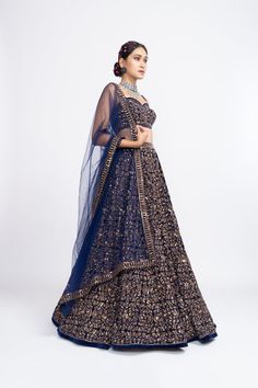 Navy blue full abstract corset lehenga set.From Vvani Vats Mahnoor collection.DELIVERY TIMEPlease allow 8-12 weeks for your outfit to arrive.FABRIC DETAILSVelvet, NetProfessional cleaning only. Anarkali Royal Blue Fitted Choli, Fitted Anarkali Choli In Royal Blue, Royal Blue Resham Embroidery Fitted Choli, Fitted Royal Blue Anarkali Choli, Royal Blue Fitted Choli With Resham Embroidery, Fitted Royal Blue Choli With Resham Embroidery, Fitted Blue Choli With Intricate Embroidery, Blue Embroidered Party Wear Dupatta, Royal Blue Fitted Choli For Festive Occasions