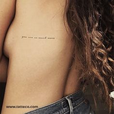 a woman's chest with the words you are married written on her left side