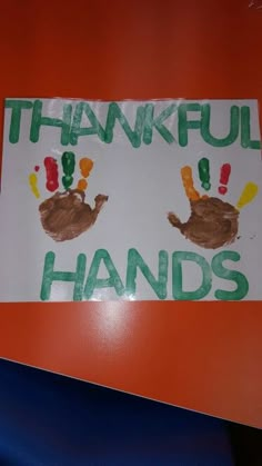 handprints on a sign that says, thank you for being handshakt