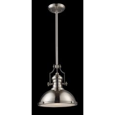 an industrial style pendant light hanging from the ceiling with metal fittings and a black background