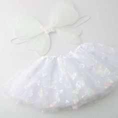 Cute Little Girls Angel Wing Tutu Set Unstretched: 8" Length: 7" White Skirt For Spring Costume Party, Spring Dress-up Sets In White, White Dress-up Sets For Spring, Fitted White Sets For Dress-up, White Fitted Sets For Dress-up, Cute Stretch White Sets, White Fitted Dress-up Sets, Cute White Dress-up Sets, Playful White Fitted Skirt