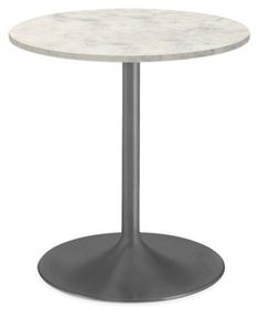 a round table with a white marble top and metal base, on an isolated background