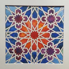 a colorful stained glass window with an intricate design