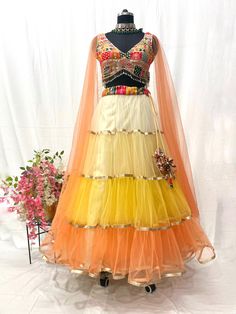 Designer Indian wedding wear lehenga blouse for women. Lehenga comes with stylish blouse which is made to measure also. * Plus size available. * Size: This is custom made outfit as per your size. Post your order we will send you a measurements reference sheet using which you can provide details required to make your outfit with best fit. * Fabric and work: Lehenga - Net fabric. Blouse - Embroidered georgette fabric. Dupatta - It does not have a separate dupatta. * Delivery time: This lehenga set Multicolor Choli For Wedding, Traditional Drape Skirt Set For Wedding, Fitted Multicolor Sharara With Unstitched Blouse, Multicolor Embroidered Choli With Pallu, Fitted Resham Embroidery Skirt Set, Unstitched Lehenga With Blouse For Navratri, Fitted Organza Lehenga With Intricate Embroidery, Fitted Multicolor Georgette Lehenga, Designer Fitted Organza Lehenga