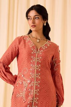 Peach jacket with thread zari embroidered floral motifs, embellished by beads on geometric woven base. Comes with solid palazzo. - Aza Fashions Sets With Blouson Long Sleeves, Peach Jacket, Women Kurta, Woven Jacket, Floral Motifs, Aza Fashion, Fashion Set, Floral Motif, Three Quarter