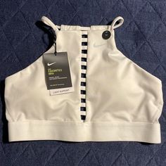 Bnwt Nike Ladder Sports Bra Medium. Lightly Padded With Ladder High Neck Halter Front. White Sports Bra For Light Summer Sports, White Sports Bra For Light Summer Activities, Sporty Bra-friendly White Top, Sporty White Bra Friendly Tops, Sporty White Bra-friendly Top, Nike Sports Bra For Spring, Nike Sporty Sports Bra For Spring, Nike Spring Sports Bra, White Sports Bra For Summer Training