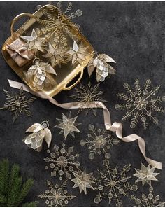 gold christmas decorations on a black table