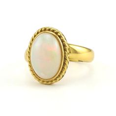 Alchemía Ethiopian Opal Oval Rope Ring Luxury Handmade Ethiopian Opal Ring, Luxury Ethiopian Opal Cabochon Rings, Rope Ring, Rope Rings, Green Fire, Ring Setting, Base Metal, Ethiopian Opal, Ring Sets