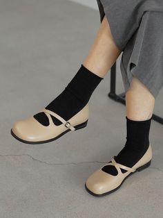 Editor's NotesByeuuns' shoes offers classic and modern moods.- Light-weighted- Eye-catching crossing straps with buckle detail- Trendy round square toe design- Feminine and minimal styleMeasurements(in.)- Size: KR 225MM (US 5.5) ~ KR 250MM (US 8)- Heel Height: 0.59in.*Fits true to size.Composition & Care- Sheepskin- Lining: pig skin- Avoid direct heat and moisture- Professional cleaning is recommendedDesigner- by Byeuuns Classic Mary Janes With Buckle Closure, Classic Mary Janes With Almond Toe And Buckle Closure, Fall Square Toe Mary Janes With Buckle Closure, Classic Medium Width Mary Janes For Spring, Classic Spring Mary Janes In Medium Width, Classic Spring Mary Janes Medium Width, Classic Mary Janes For Spring, Medium Width, Fall Low Heel Mary Janes With Buckle Closure, Spring Mary Janes With Penny Strap And Round Toe