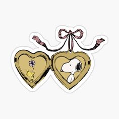 two heart shaped stickers with a dog on one and a cat on the other