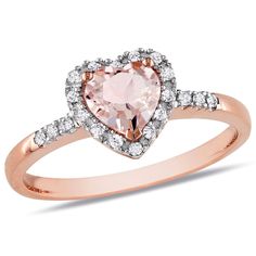 This lovable heart ring features a heart-cut morganite center stone and round-cut white diamond set in rose gold. The beautiful ring glimmers with a high polished finish. Morganite Rings, Rose Gold Heart Ring, Heart Halo Ring, Engagement Ring Pink, Frame Ring, Rose Gold Halo, Gold Heart Ring, Rose Gold Morganite, Diamond Heart Ring