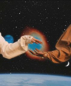 two hands reaching out to each other in the air with space and earth in the background