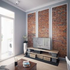 a living room with brick walls and wooden furniture in the corner, along with a coffee table