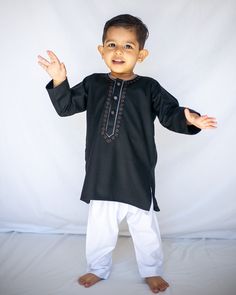 WE HAVE RECENTLY REORGANIZED OUR SHOP. PLEASE SEE OUR ETSY SHOP PAGE FOR ADDITIONAL COLOR KURTAS IN THIS DESIGN. Adorable, made-to-order kurta for infant, toddler and kid boys! Kurta ➤ Breathable and easy-to-wash cotton fabric ➤ Easy open and close clasp-buttons ➤ No-itch collar and sleeves ➤ Wide neck to easily fit over baby's head ➤ Options for plain or decorative sleeves and neckline Pajama / Pant / Trouser ➤ Breathable and easy-to-wash cotton fabric ➤ White to match with several kotis, kurta Long Sleeve Choli With Dabka For Diwali, Eid Long Sleeve Choli With Dabka Work, Eid Choli With Dabka Work And Long Sleeves, Traditional Black Cotton Bandhgala, Cotton Long Sleeve Bandhgala For Traditional Ceremonies, Cotton Bandhgala For Traditional Ceremonies, Long Sleeve Cotton Bandhgala For Traditional Ceremonies, Cotton Bandhgala For Eid Ceremonial, Cotton Bandhgala For Eid Ceremonies