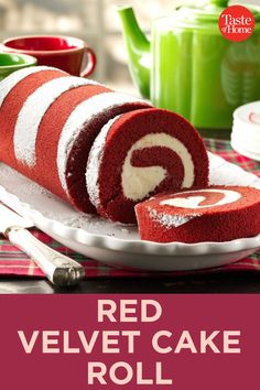 a red velvet cake roll on a plate with the words, red velvet cake roll