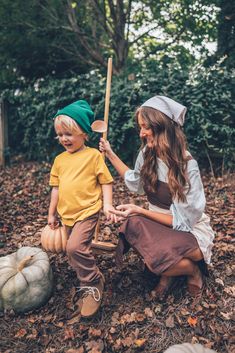 two children dressed up as peter pan and robin