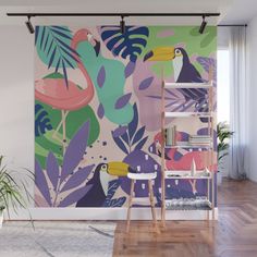 a colorful wall mural with birds and plants