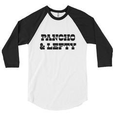 Pancho & Lefty T-Shirt *MADE TO ORDER* This is a made to order T shirt. The shirt takes roughly three business days to make then ships immediately. You usually have your t shirt within a week if purchased within the US, but sometimes it takes a bit longer. About the shirts Regular T shirt Description The American Apparel 2001 is the classic t-shirt. Its fine jersey cotton construction makes it extremely soft and comfortable to wear. It's a good choice for day-to-day wear - it's durable and c Tri-blend Crew Neck T-shirt With Band Merch, Band Logo Crew Neck T-shirt, Unisex Band Logo T-shirt Crew Neck, Band Logo T-shirt With Crew Neck, White Music-themed Crew Neck T-shirt, Unisex Band Merch T-shirt With Crew Neck, Unisex Crew Neck T-shirt For Fan Merchandise, Unisex Band Merch Top With Graphic Design, Unisex Graphic Band Merch Tops