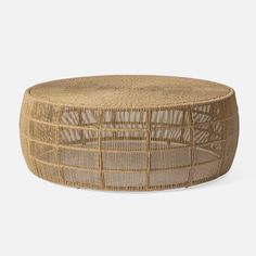 a round wicker table with woven material