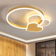 a modern light fixture in the middle of a room