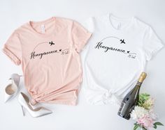 two women's t - shirts with the words honeymoon and champagne next to them