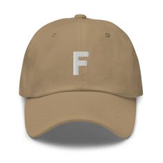 "This initial dad hat makes a perfect gift for your bridal party, bachelorette parties, or is a great 'treat yourself' gift!  * 100% chino cotton twill * Unstructured, 6-panel, low-profile * 6 embroidered eyelets * 3 ⅛\" (7.6 cm) crown * Adjustable strap with antique buckle * Head circumference: 20 ½″-21 ⅝″ (50.8 cm-53.3 cm)" Bridal Party Bachelorette, Party Bachelorette, Monogram Alphabet, Dad Cap, Love Hat, Letter F, Camo Colors, Bachelorette Parties, Dad Caps