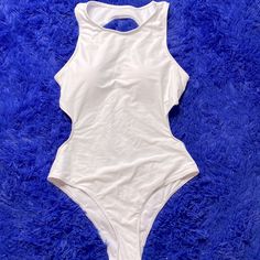 Nwt Shein White One Piece High Neck Bathing Suit X-Large Perfect Condition Thank You For Looking Liking And Sharing Let Me Know If You Have Any Questions White One-piece Beach Top, White Tops For Pool Days In Spring, Sleeveless Cutout Beach Tops, Casual White Tops For Pool, Casual White Top For Pool, White One-piece Casual Top, White One-piece Top For Spring, White Sleeveless Top For Poolside, White Hollow Out Beachwear Top