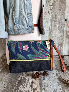 A large, fully lined zipper pouch with a wrist loop. A fun large clutch for a night out or the perfect pouch to carry around essentials like an iPad! Comes in different fabrics! Handcrafted with love in the USA.Dimension: About 14.00"W x 10.00"H x 2.00"D Lined Zipper Pouch, Knitting Needle Storage, Handcrafted Handbags, Local Yarn Shop, Project Bags, Tool Pouch, Large Clutch, Hand Dyed Yarn, Different Fabrics