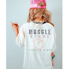 Muscle Mommy Lifting Club - the ultimate pump cover for moms!  This classic unisex jersey short sleeve tee fits like a well-loved favorite. Soft cotton and quality print make users fall in love with it over and over again. These t-shirts have-ribbed knit collars to bolster shaping. The shoulders have taping for better fit over time. Dual side seams hold the garment's shape for longer.  .: 100% Airlume combed and ringspun cotton (fiber content may vary for different colors) .: Light fabric (4.2 o Muscle Mommy, Fitness Shirt, Pump Cover, Gym Shirt, Gym Shirts, Mom Shirt, Mom Shirts, Jersey Shorts, Cotton Fiber