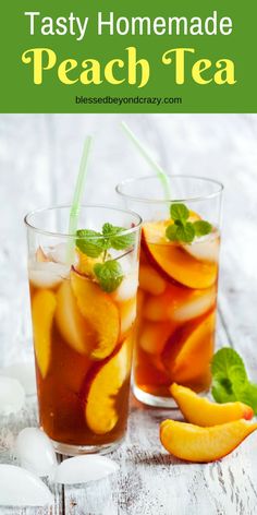 two glasses filled with iced tea sitting on top of a table