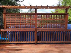 a wooden deck with a blue tarp on it