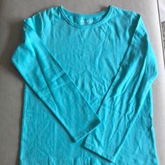 Long Sleeves Aqua Blue Plain Long Sleeves Tee. No Label But Was Never Worn In 100% Cotton. Plain Blue T-shirt For Spring, Basic Blue Long Sleeve T-shirt, Blue Long Sleeve Basic T-shirt, Basic Plain Blue Tops, Basic Blue Plain Tops, Casual Plain Blue Tops, Basic Blue Spring Shirt, Basic Light Blue Plain Top, Basic Light Blue Plain Tops