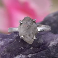 FREE SHIPPING IN THE UK The ring is solid 925 Sterling Silver Ring with the stone Rough Herkimer Diamond. The setting adds beauty and flair to the item. The ring is adjustable from UK size K to U. Metal - 925 Sterling Silver Metal Purity - 92.5% Solid Silver  Measurements: Stone Size: 6.5 mm Ring Weight: 2.75 grams About the Stone: Properties : This stone helps with healing because of its brilliance and clarity. Believed to receive and magnify the influence of other stones and energy.  Helps wit Stone Properties, Herkimer Diamond Ring, Valentines Birthday, Birthday Gift For Women, Valentine Birthday, Herkimer Diamond, Birthday Gifts For Women, Adjustable Ring, Gift For Women